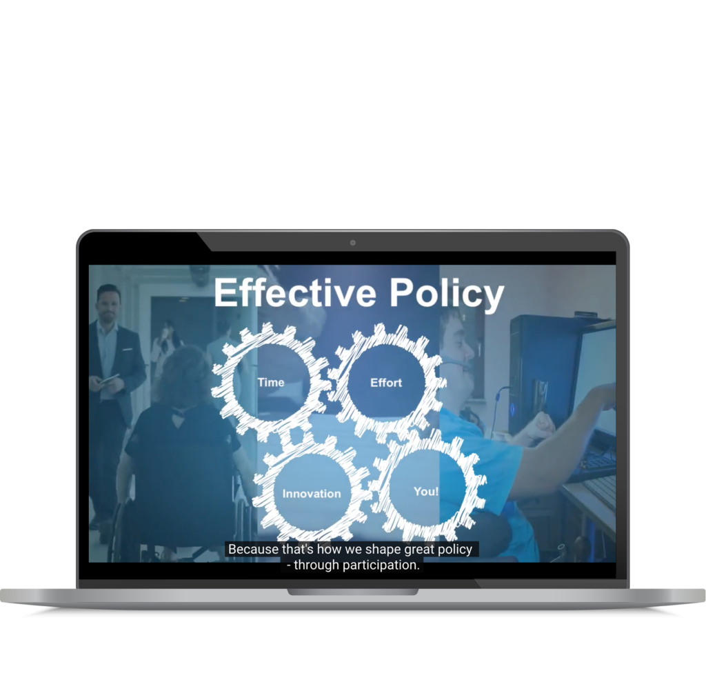 Video playing on a laptop with the words Effective Policy on the screen along with 4 gears turning.